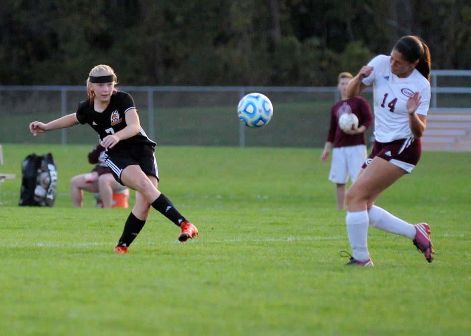 Warsaw's Delaney Taylor unloads what would become the game-winning goal Tuesday night in a 3-2 win against Culver Academy. (Photos by Mike Deak)