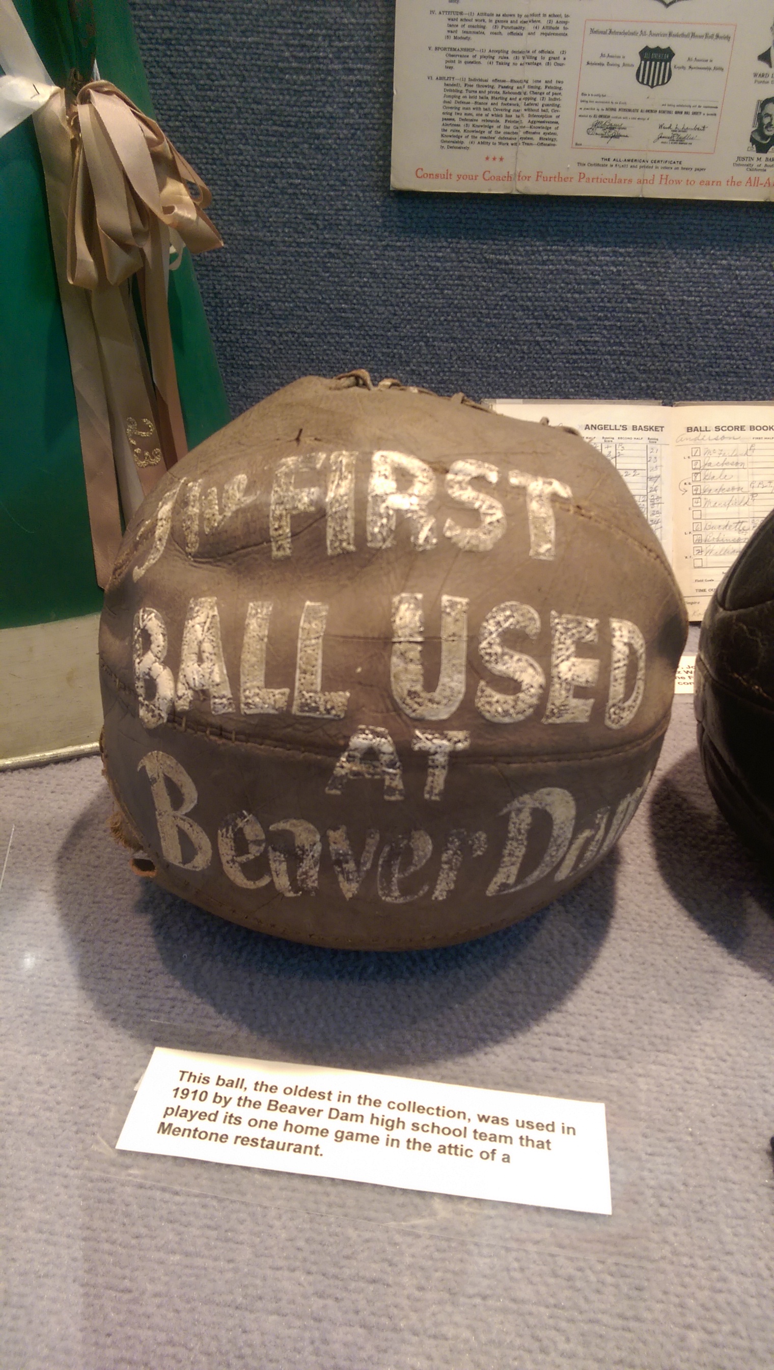 The first basketballs were meant to be thrown, not dribbled. This ball, used in 1910 at Beaver Dam High School in Akron, is the oldest in the Hall of Fame’s collection.