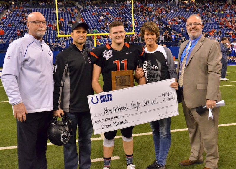 NorthWood's Drew Minnich (center) was named the Phil N. Eskew Mental Attitude award winner following the conclusion of Friday's state championship game. (Photos by Nick Goralczyk)