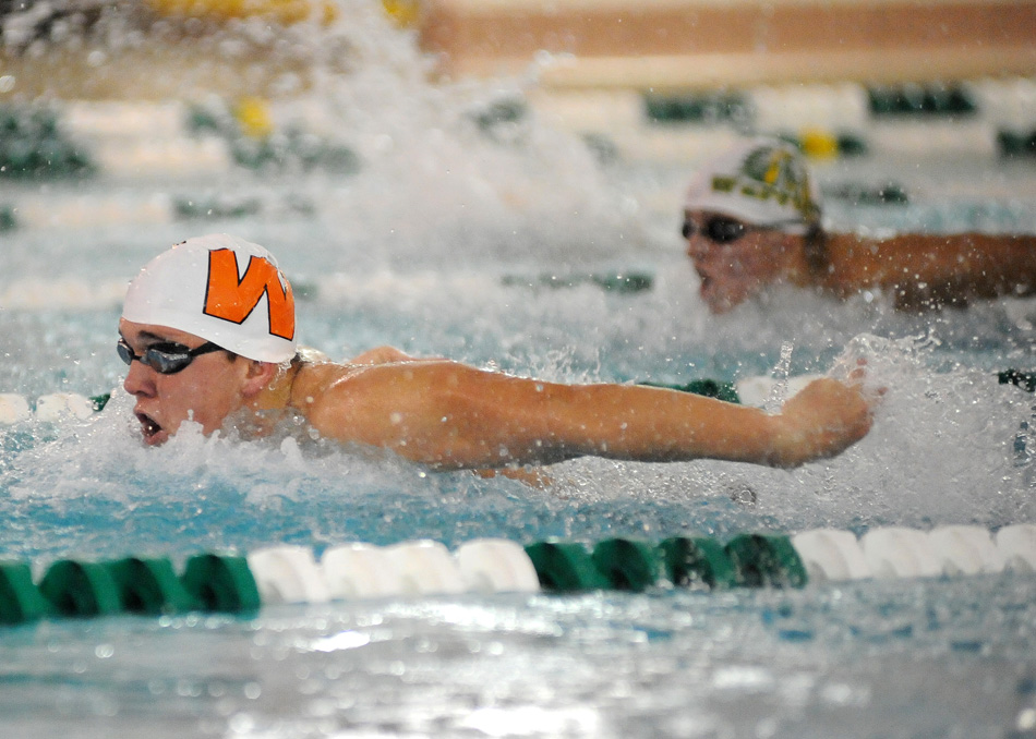 Warsaw's Evan Borchers extends his lead in a big win in the butterfly Saturday morning at Wawasee. (Photos by Mike Deak)