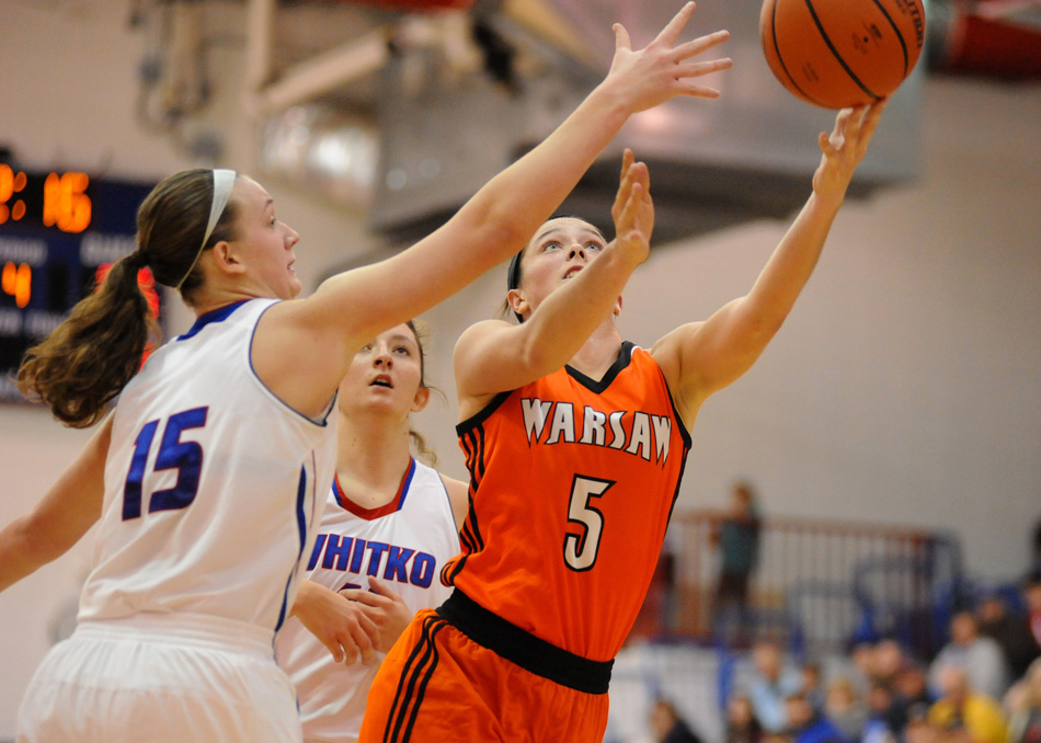 Warsaw's Page Desenberg led all scorers with a career-high 16 points against Whitko Friday night. (Photos by Mike Deak)