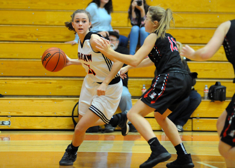 Warsaw's Dayton Groninger overcame a tough first half to score a game-high 20 points to help the Lady Tigers over Fort Wayne Bishop Luers 63-50 Saturday night. (Photos by Mike Deak)