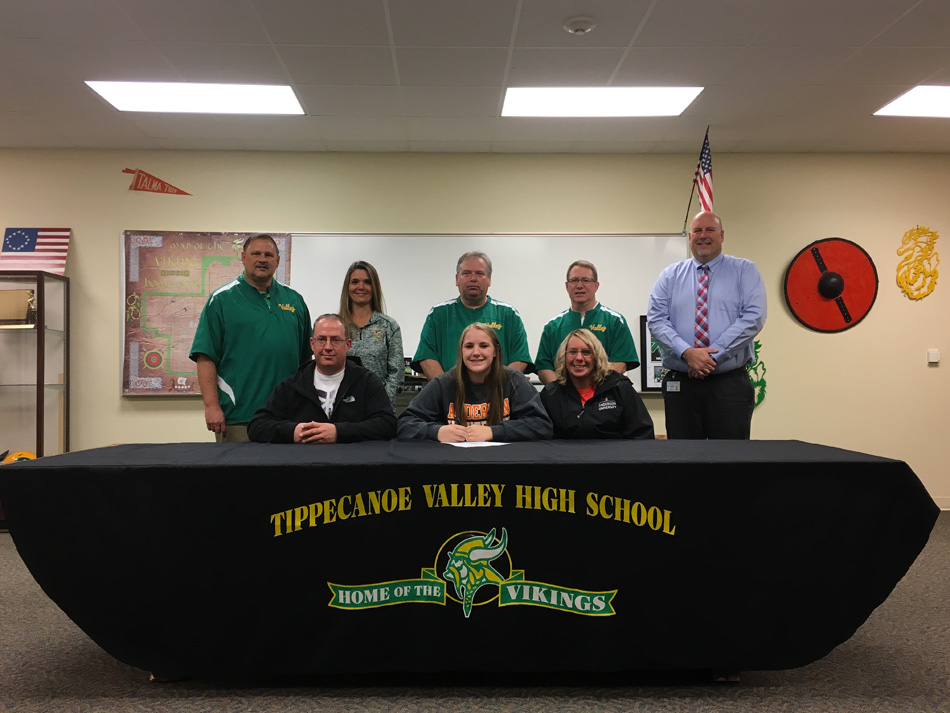 Tippecanoe Valley High School senior Hannah Dunn signed her letter of intent to continue her basketball career at Anderson University. Seated with Hannah are parents James and Nicole Dunn. In the back row are TVHS athletic director Duane Burkhart, TVHS assistant coach Alyssa Trippiedi, TVHS head coach Chris Kindig, TVHS assistant athletic director Scott Smith and TVHS assistant principal John Hutton. (Photos by Mike Deak)