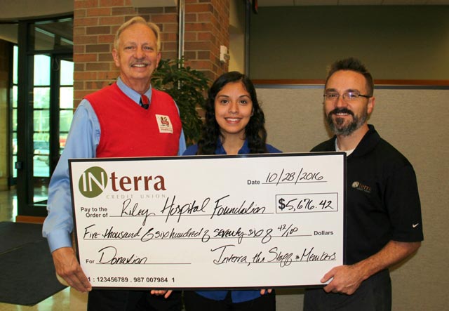 Interra Credit Union recently held a fundraiser and raised more than $5,600 for the Riley Children’s Foundation. On hand for the presentation are, from left, Bob Yenna, Mishawaka, an ambassador for Riley; Esmy Salazar, an Interra employee who had surgery at Riley last year; and John Eicher, the Interra staff member who promoted the idea for the Riley fundraiser.