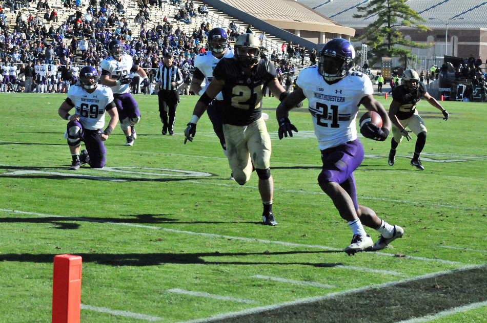 Northwestern's Justin Jackson runs in from 19 yards for a touchdown as part of Northwestern's 45-17 win at Purdue Saturday afternoon. (Photos by Dave Deak)