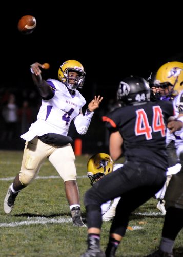 New Haven quarterback Keshawn Moore whistles a pass against NorthWood.