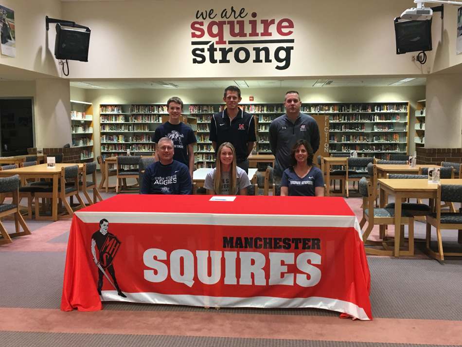 Manchester High School senior Rae Bedke signed her letter of intent Tuesday to continue her running career at Utah State University. Seated with Rae are parents x and x. In the back row are xxx. (Photo provided by Jeremy Markham)