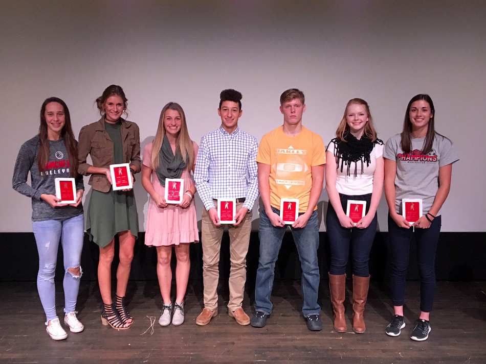 Manchester High School issued its fall sports awards, which included the Squire Awards. From left to right are Sydney Day, volleyball; Lydia Little, golf; Rae Bedke, girls cross country; Spence Trick, boys tennis; Kane Gable, football; Teri Ann Hall, cheerleading; and Brooklyn Howard, girls soccer. Not pictured are Nathan Self, boys soccer, and Montgomery Pattison, boys cross country. (Photo courtesy the Manchester Athletics Twitter)