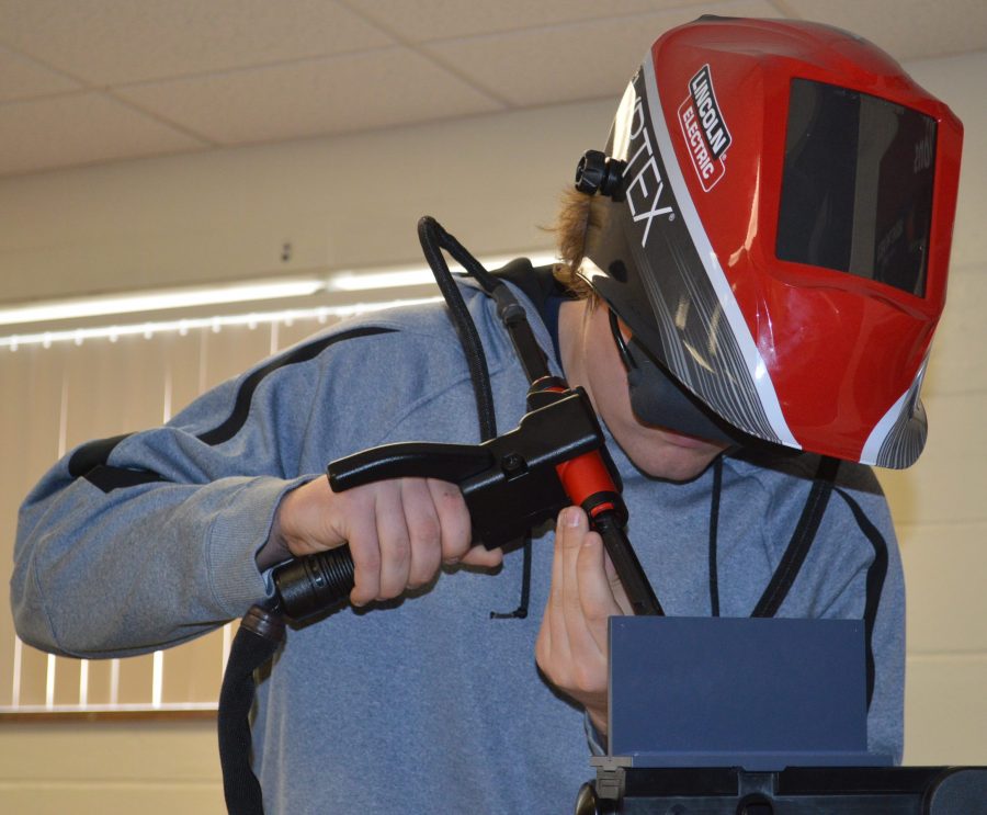 Wawasee student Dominic Richardson using the virtual welder.