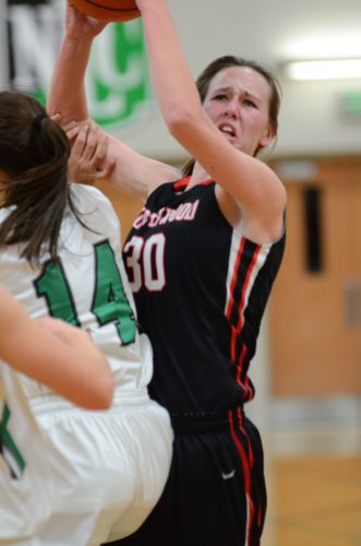 Savannah Fenestra goes inside for a hoop for NorthWood during a 49-30 NLC win at Concord Friday night.