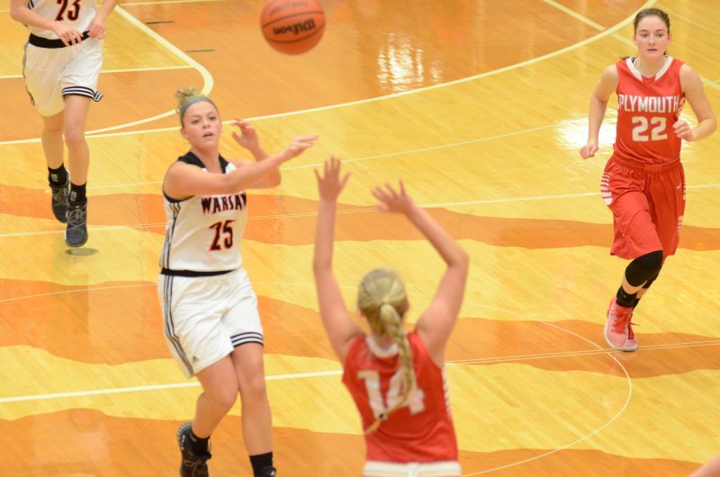 Madi Graham fires a pass up the court for Warsaw. The senior was outstanding with 17 points in a 61-44 NLC win over Plymouth Saturday night.