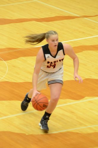 Kaylee Patton heads up the floor for the Tigers.