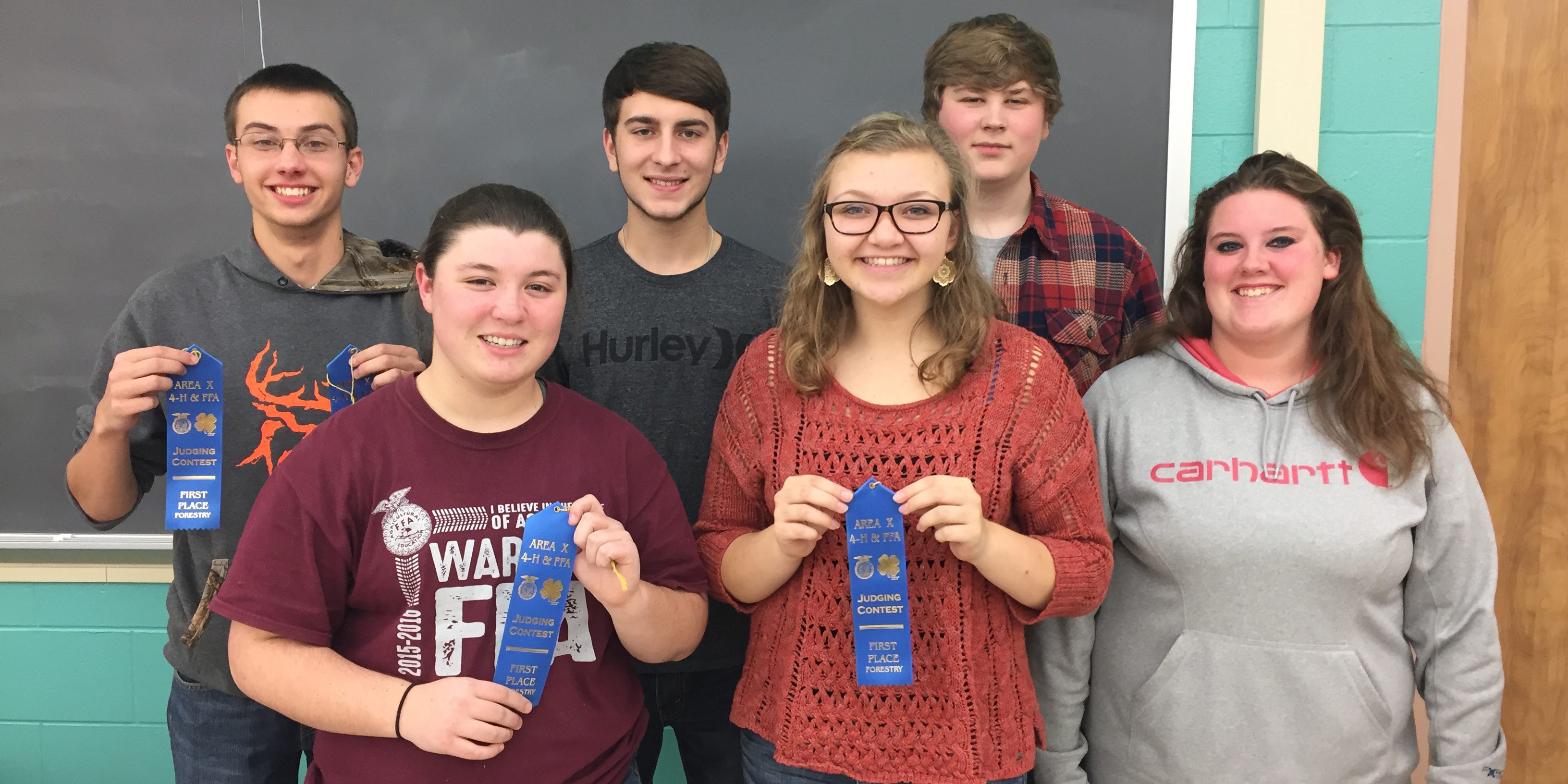 Warsaw FFA Forestry Judging Teams. In front, from left, are Taryn Whetstone, Morgan Smith and Sydney Fox. Back row are Zach Howard, Grant Reed and Jared Wolf.