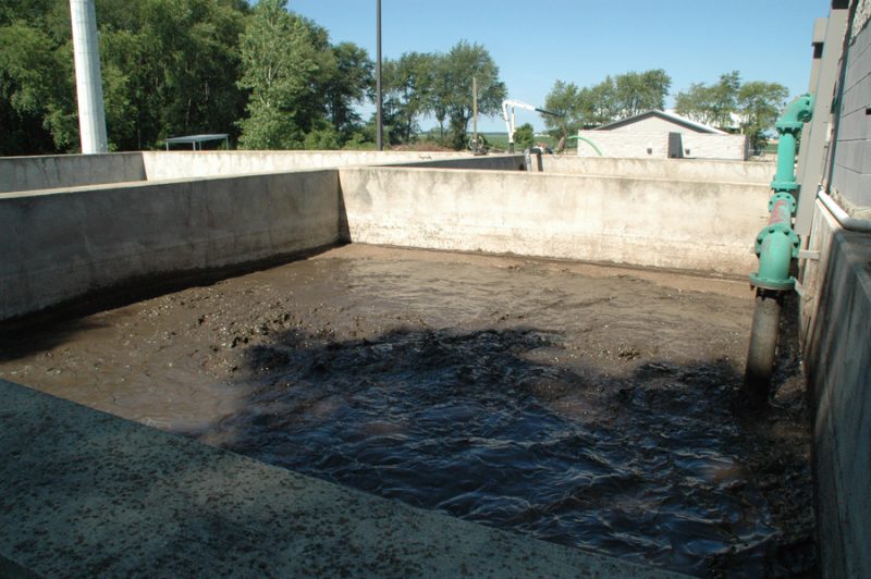 New IDEM regulations require phosphorous removal from wasterwater. Sludge holding tanks like the this one at Milford's wastewater plant are a big part of the process, which creates twice as much solid waste. Milford's plant is undergoing upgrades in 2017 to comply with the regulations. (Photo by David Hazledine