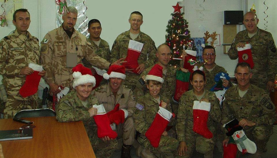 For the past three years Susan Manns has headed a stocking collection for soldiers deployed during Christmas as part of the Treasures for Troops organization. These stockings cost little to build and provide each of the nearly 450 soldiers which the organization helps a brief reminder from home during the holidays. Pictured are just one of the groups who received stockings last year.