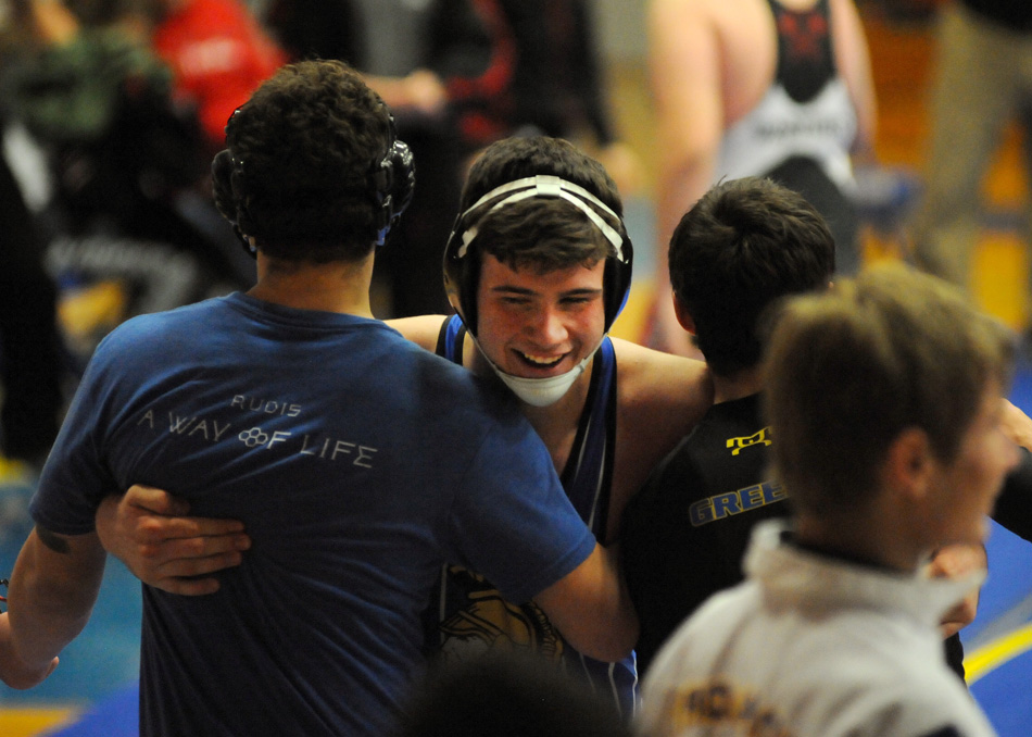 Triton's Bryson Seitner receives some love after scoring a pin against North Miami Tuesday night. (Photos by Mike Deak)