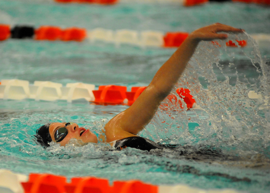 Warsaw's Taylor Gunter competes in the individual medley Thursday night against Northridge.