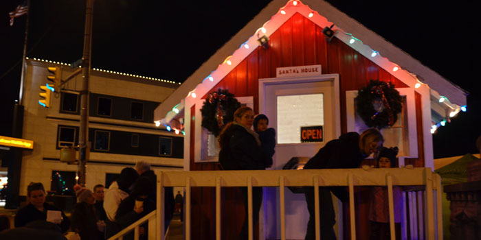 Families and children waited anxiously to meet Santa in Santa's House, sponsored by Optimist Club.