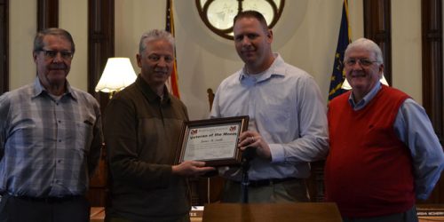 Pictured left to right: Ron Truex, Rich Maron, James Smith, veteran of the month, and Bob Conley.