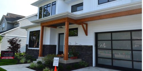 Built by Signature Building & Design, this home, located on E. Cherokee Road in Syracuse, highlighted the best of modern design, complete with a glass garage door.