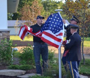 Flag ceremony at Operation Finally Home dedication ceremony